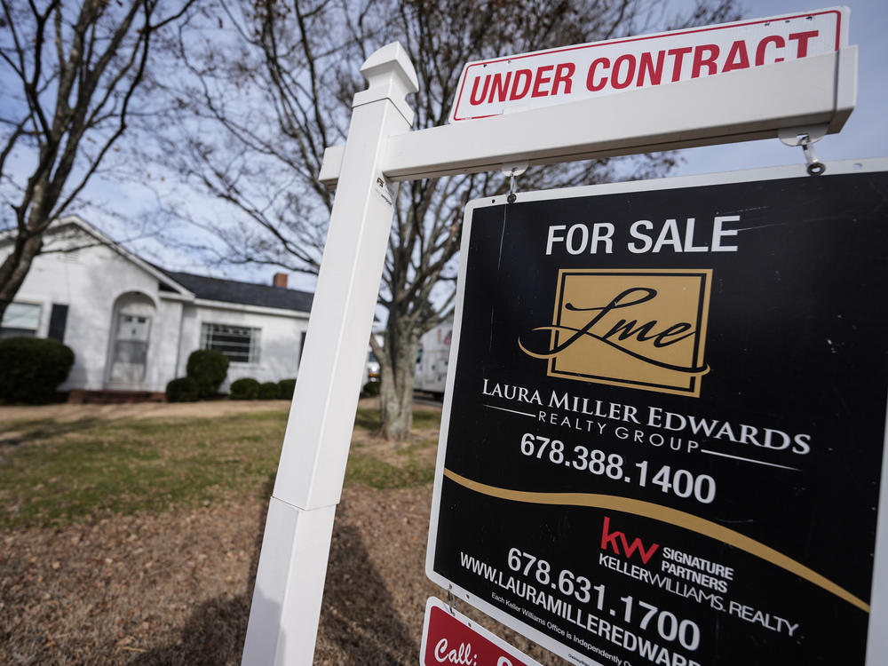 A home for sale sign on Tuesday, Jan. 16, 2024, in Kennesaw, Ga. On Friday, the National Association of Realtors reported that 2023 saw the smallest number of home sales in nearly 30 years.
