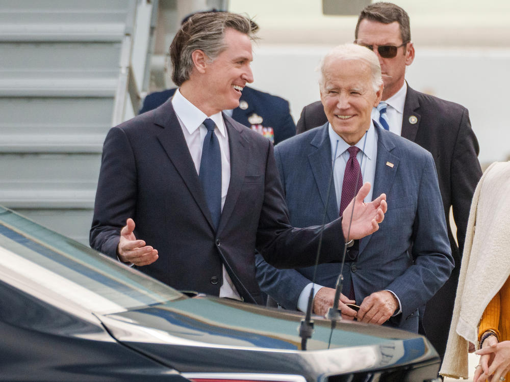 President Biden greets California Gov. Gavin Newsom at San Francisco International Airport on the sidelines of the Asia-Pacific Economic Cooperation summit on Nov. 14, 2023.