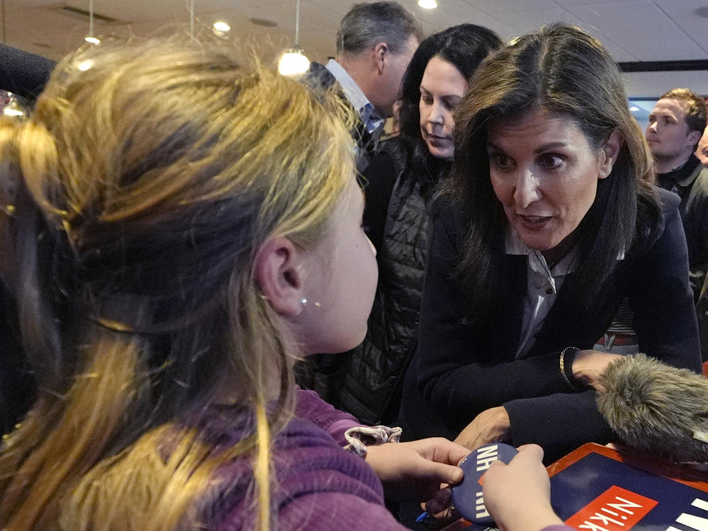 Haley chats with 10-year-old Hadley Craig during a campaign stop on Jan. 19 in Milford, N.H.