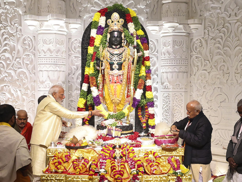 Indian Prime Minister Narendra Modi performs rituals during the opening of a temple dedicated to Hinduism's Lord Ram in Ayodhya, India, Monday.