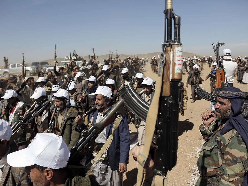 Houthi fighters march during a rally of support for the Palestinians in the Gaza Strip and against the U.S. strikes on Yemen outside Sanaa on Monday.