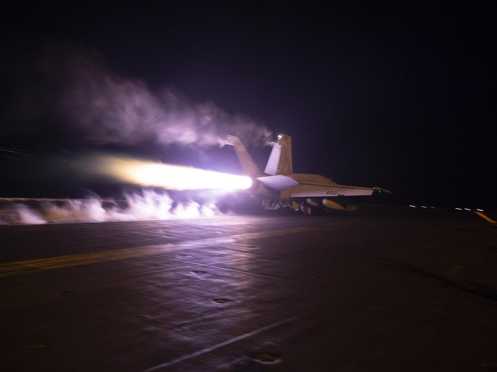 This image provided by the U.S. Navy shows an aircraft launching from USS Dwight D. Eisenhower (CVN 69) during flight operations in the Red Sea on Monday.