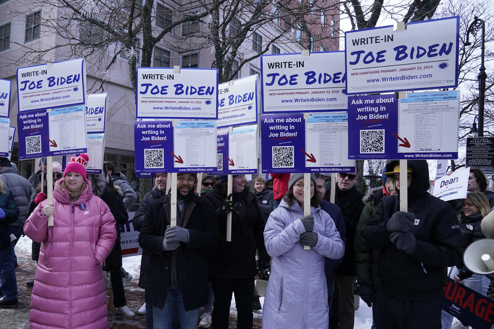On Jan. 20, Biden supporters in Manchester, N.H., rally to raise awareness about their push to write in Biden on the New Hampshire Democratic primary ballot.
