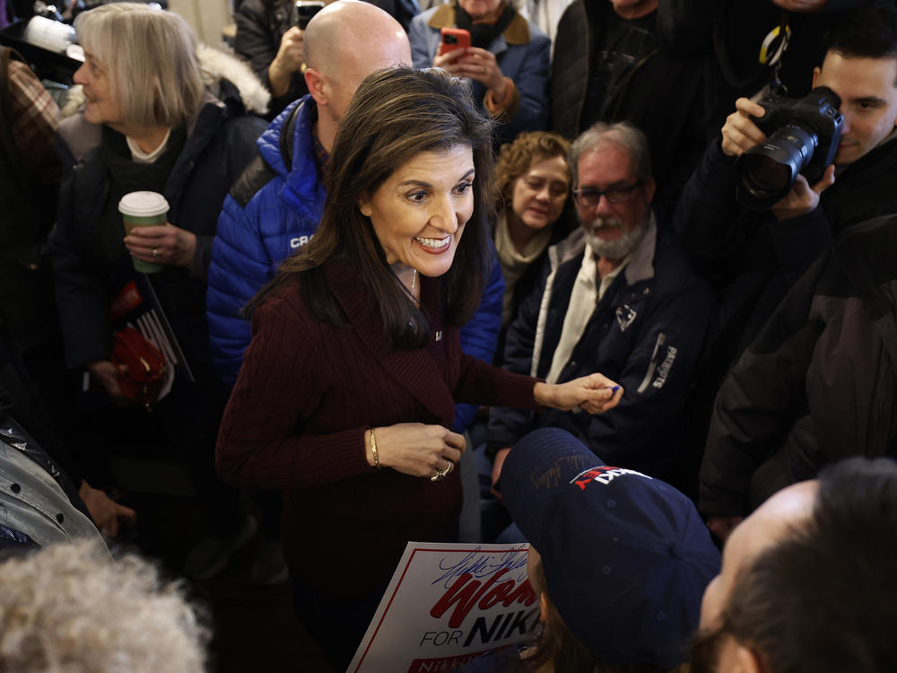 Former UN Ambassador Nikki Haley speaks to potential voters during a campaign stop in Hooksett, New Hampshire.