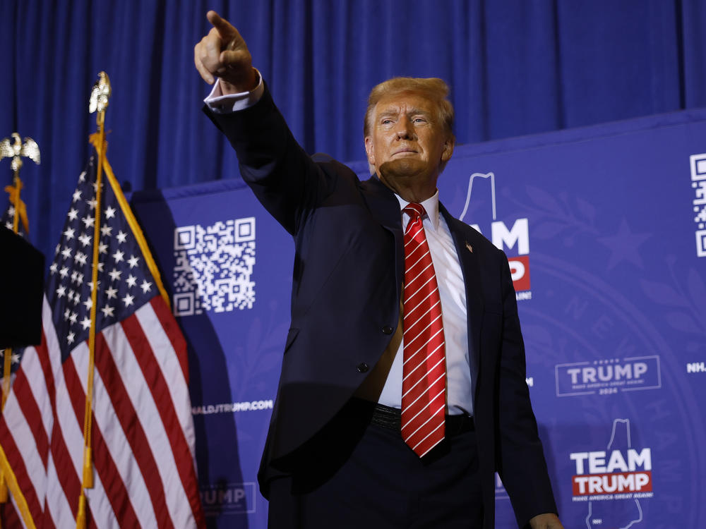 Former President Donald Trump acknowledges supporters at the end of a campaign rally on Jan. 14 in Concord, N.H.