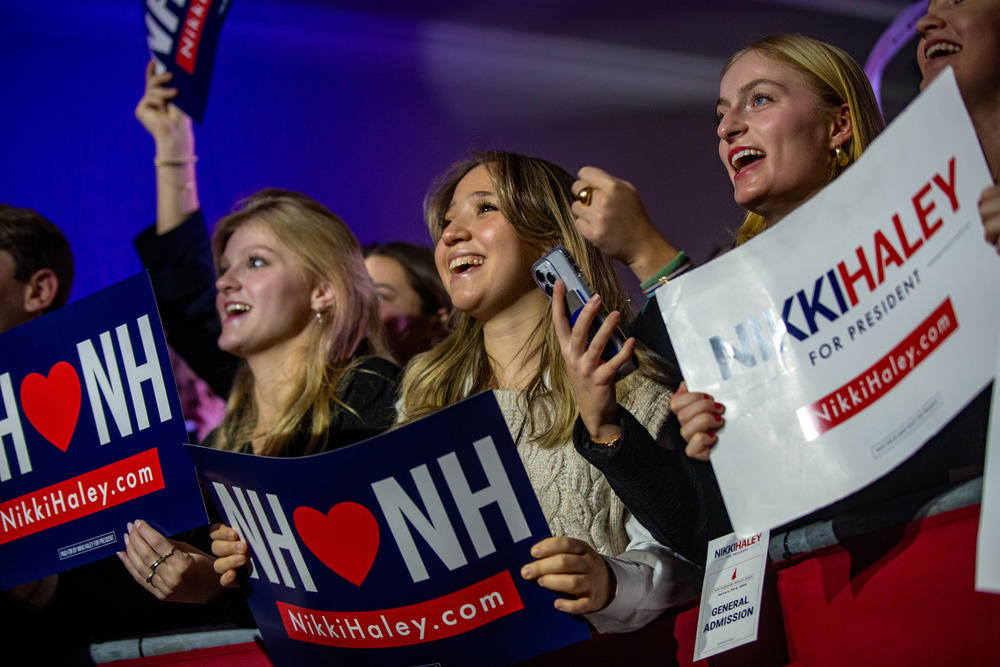 Nikki Haley supporters cheer on as the first election results come in.