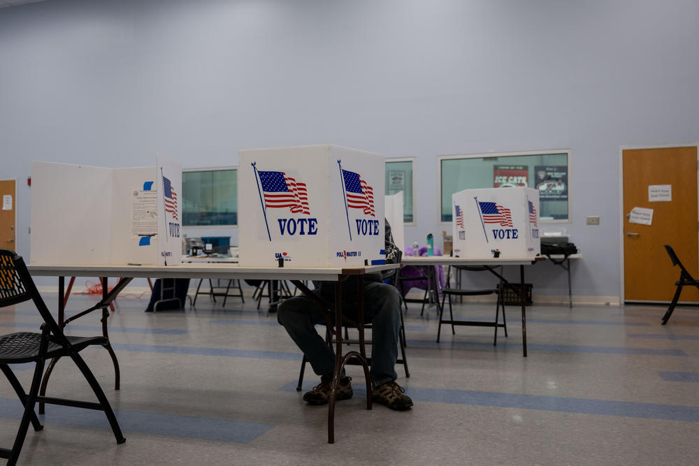 A person votes at the Keene Ward 1 polling place on Tuesday, Jan. 23, 2024, in Keene, N.H.