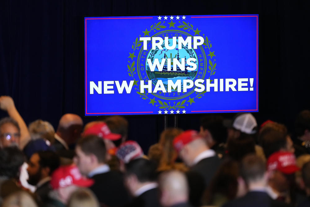 Supporters gather before Republican presidential candidate former President Donald Trump speaks at a primary election night party in Nashua, N.H., Tuesday, Jan. 23, 2024.