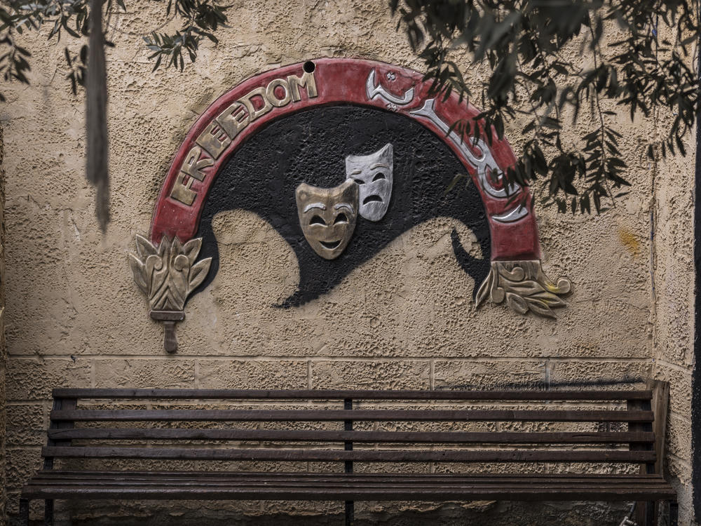 A bench is seen at the entrance of the Freedom Theatre in the Jenin refugee camp 10 days after a raid by Israeli forces, Dec. 23, 2023.