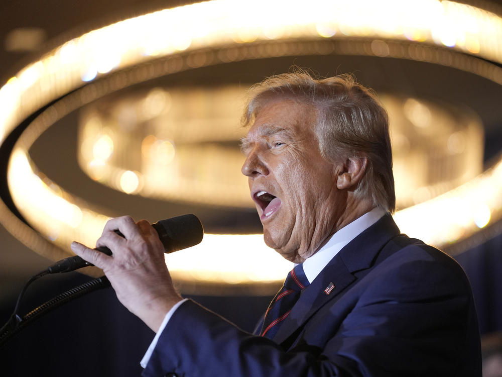 Republican presidential candidate former President Donald Trump speaks at a primary election night party after his win in the New Hampshire primary on Tuesday.