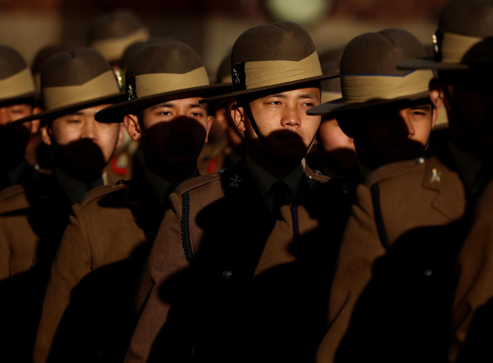 Soldiers from the Brigade of Gurkhas march on the parade ground during a ceremony at England's Catterick Garrison on Nov. 23.