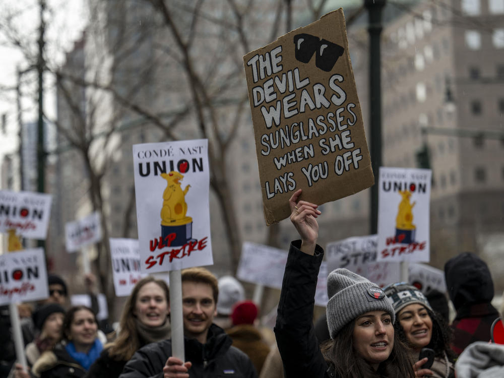 Unionized staff picket outside the Condé Nast offices in New York on Jan. 23. The company is merging the popular digital music publication Pitchfork with the men's magazine <em>GQ</em>, which has triggered anger over the resulting layoffs and concern for the outlet's future.