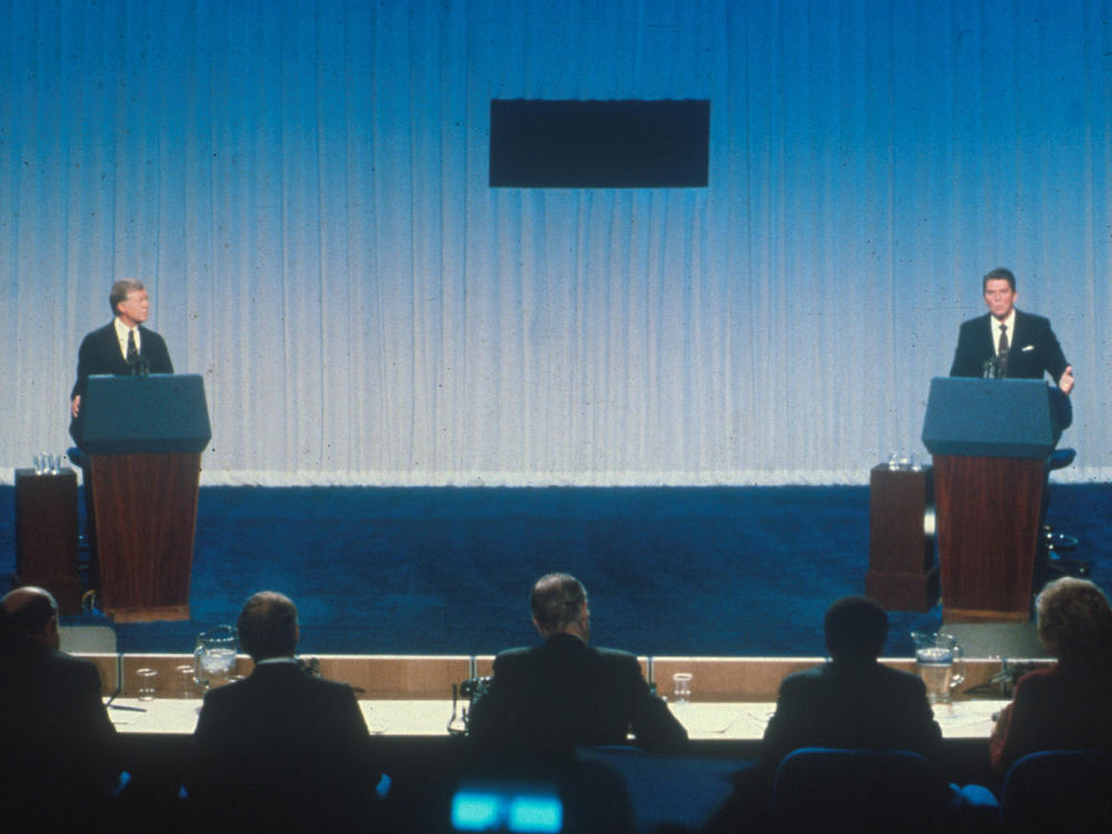 Jimmy Carter and Ronald Reagan debate each other in 1980.