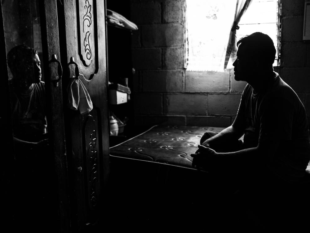 Manuel, 40, who asked not to be identified by his full name for fear of retribution by the police, spent months inside an El Salvador prison where he said he was tortured and saw his fellow prisoners die during the country's state of exception. Now, he lives with his mother in San Salvador after losing his job while he was incarcerated.