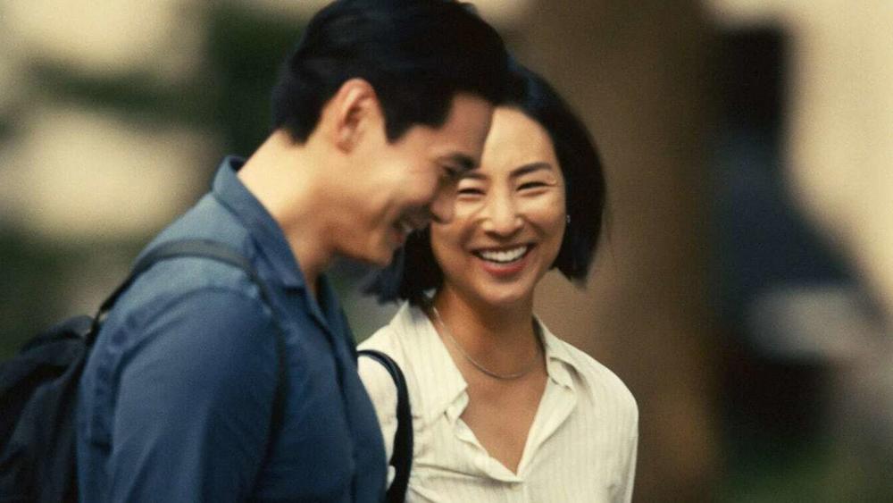 Teo Yoo and Greta Lee in <em>Past Lives. </em>
