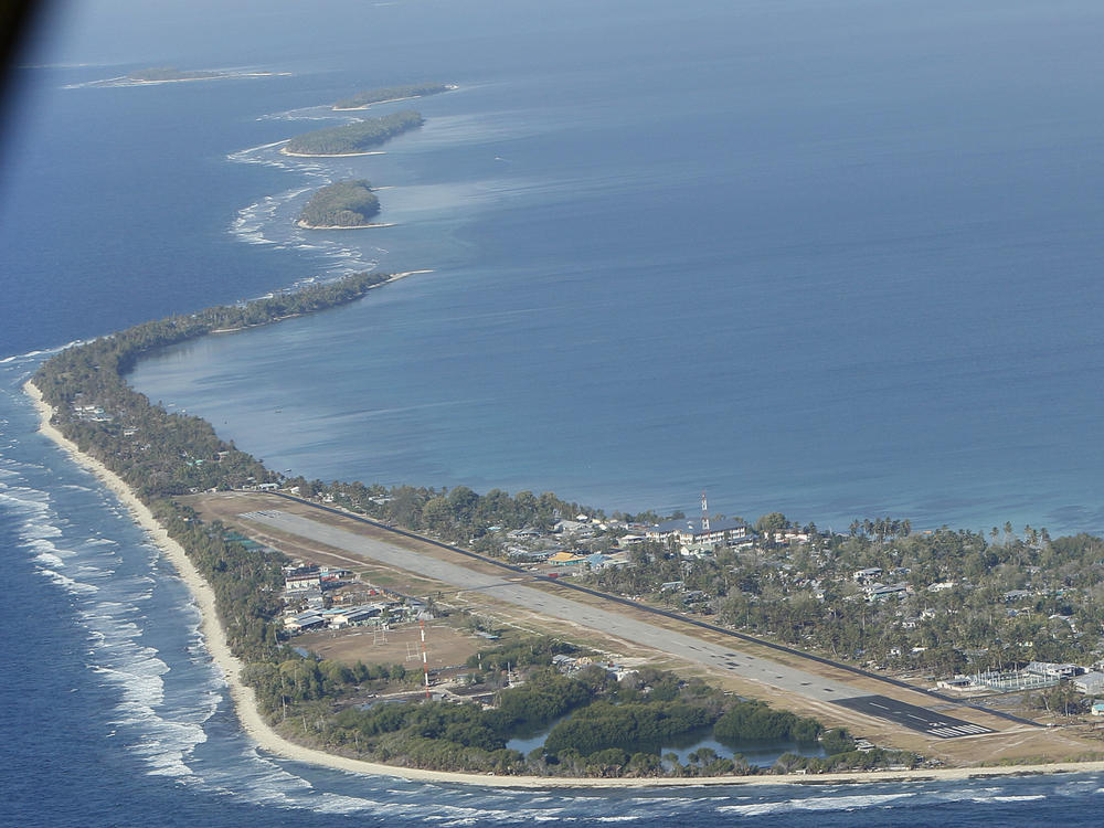 Funafuti, the main island of the nation state of Tuvalu, is photographed from a Royal New Zealand airforce C130 aircraft as it approaches the tiny South Pacific nation.