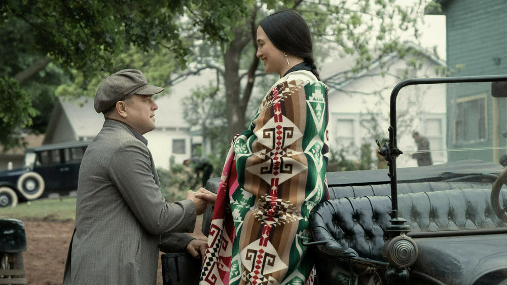 Leonardo DiCaprio and Lily Gladstone in <em>Killers of the Flower Moon.</em>