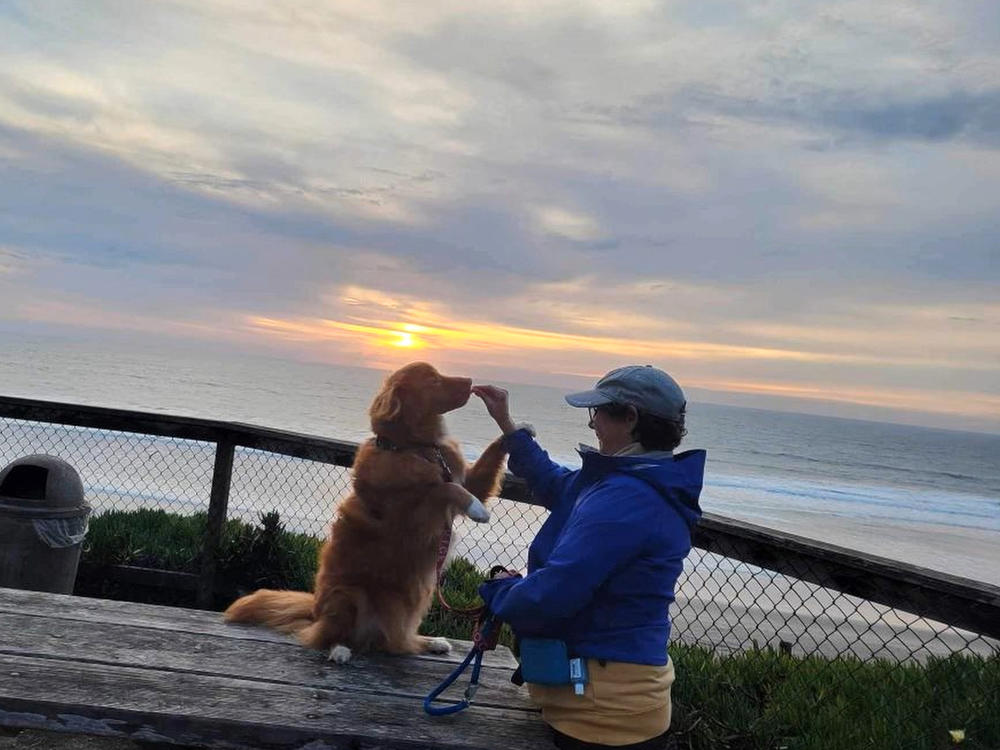 Lori Katz, pictured here with her support dog, started the ketogenic diet under Dr. Sethi's supervision. She quickly noticed a difference. 