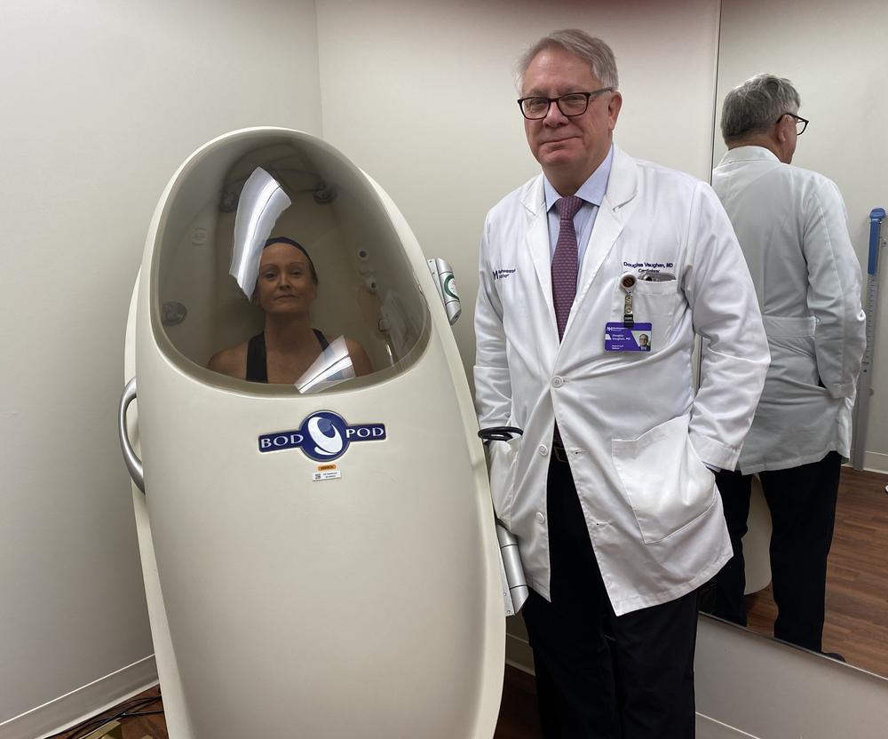NPR's Allison Aubrey has her body composition measured inside a BodPod. Several other tests performed at the longevity lab — led by Dr. Douglas Vaughan — are used to estimate biological age.