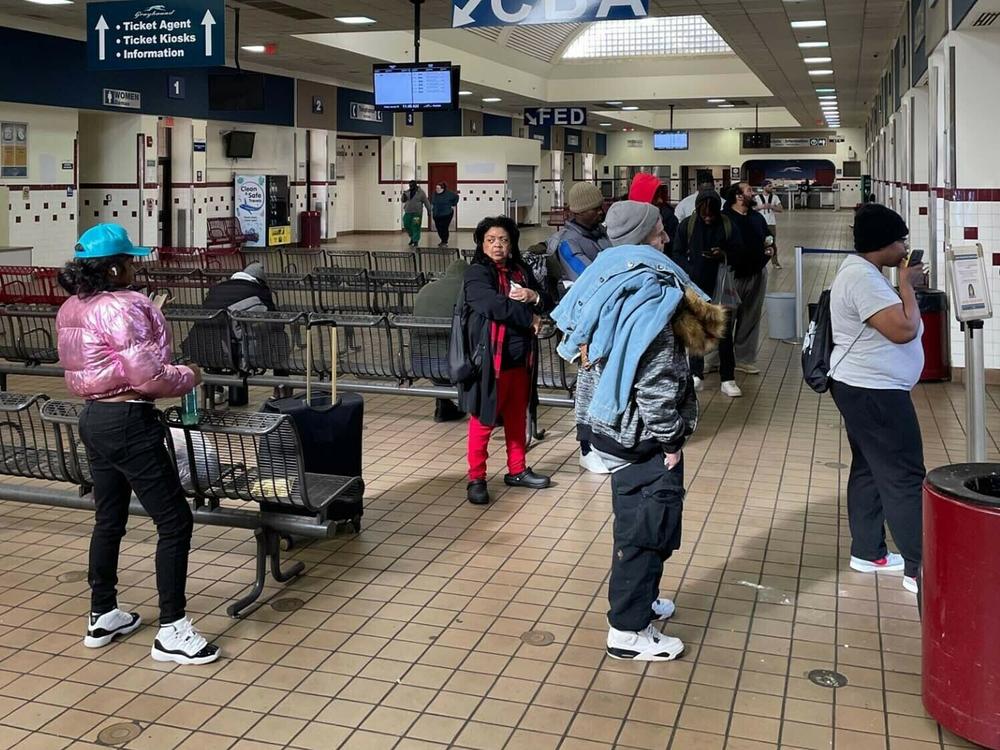 People gather at the Greyhound bus station in Richmond.