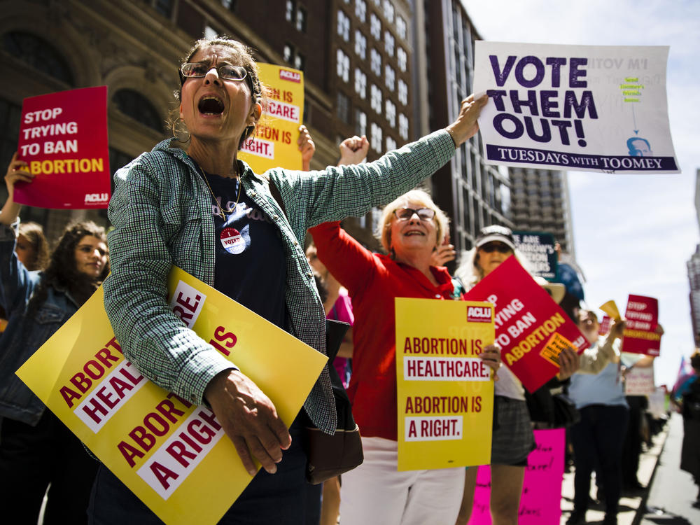 Women's rights advocates demonstrate against abortion bans in May 2019, in Philadelphia.