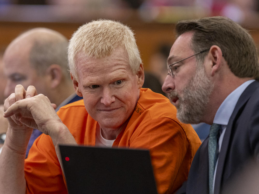 Alex Murdaugh, left, confers with Phil Barber during his hearing at the Richland County Judicial Center in Columbia, S.C., on Monday, Jan. 29, 2024.