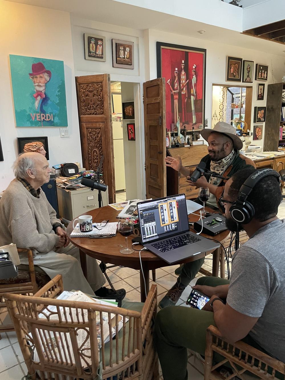 Artist David Addicks, left, speaks with Houston Poet Laureate Outspoken Bean and producer Russell Guess in 2022.