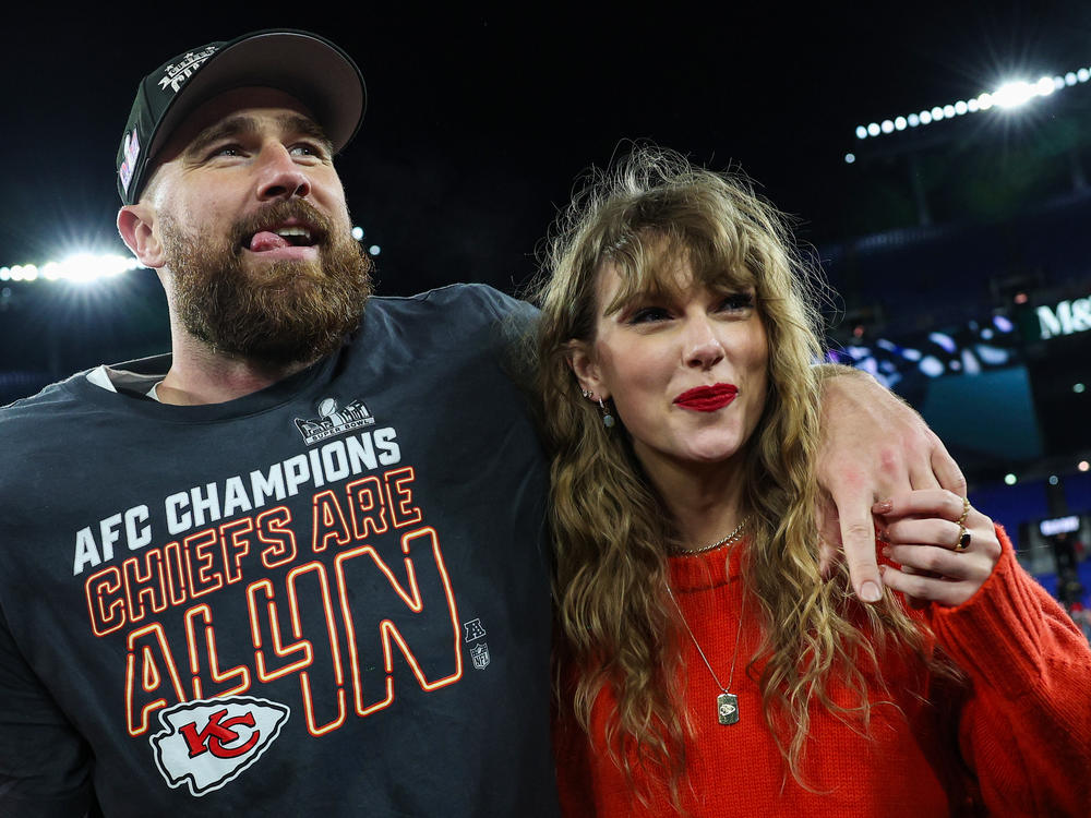 Travis Kelce and Taylor Swift celebrate after the Kansas City Chiefs defeated the Baltimore Ravens in the AFC Championship Game at M&T Bank Stadium in Maryland on Sunday.
