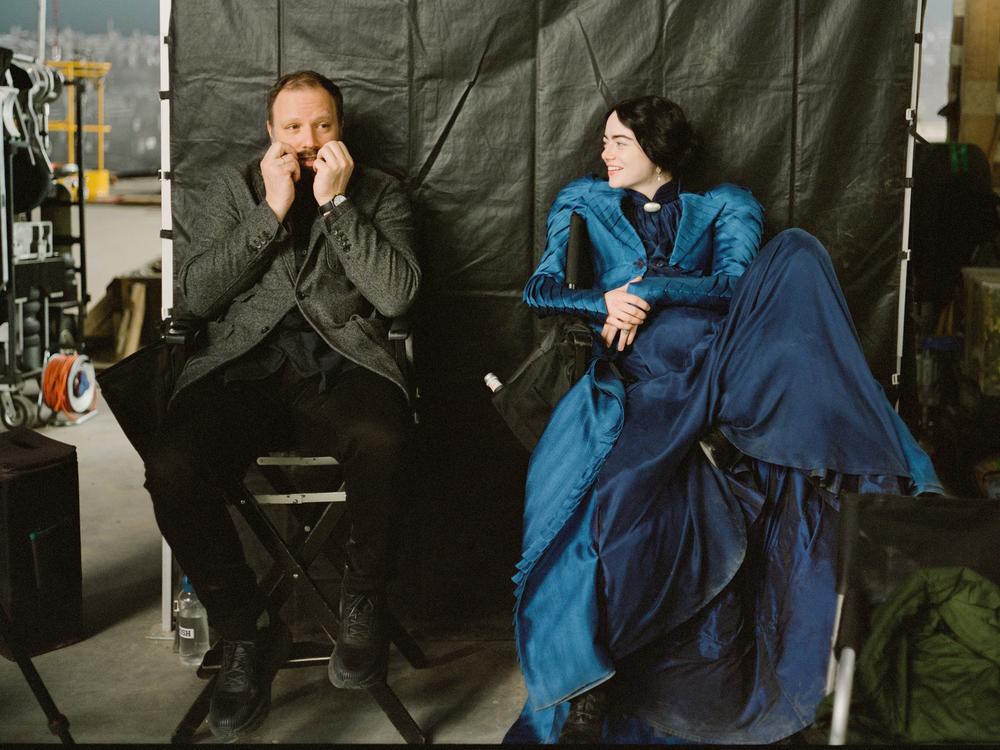 Director Yorgos Lanthimos and Emma Stone on the set of <em>Poor Things.</em>
