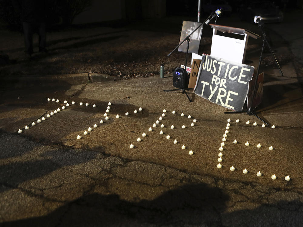 Candles spell out the name of Tyre Nichols during a candlelight vigil on the anniversary of his death, Jan. 7, 2024, in Memphis, Tenn.