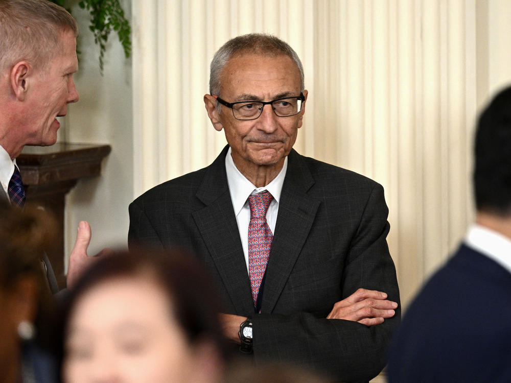 John Podesta looks on during a meeting between President Biden and mayors at the White House on Jan. 19, 2024.