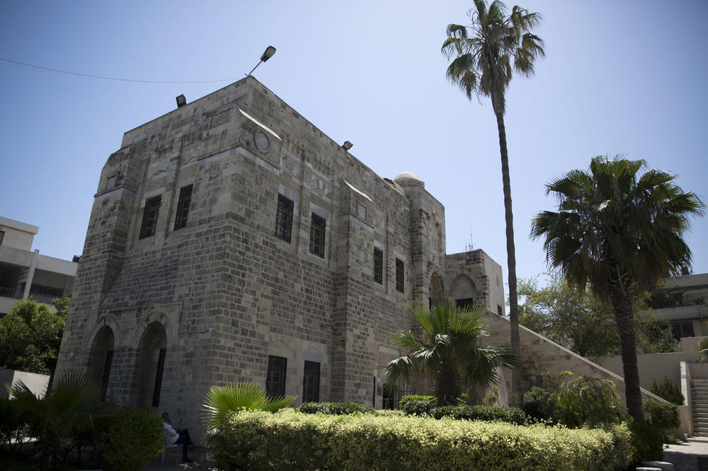 Palm trees grow in the garden of the historical Pasha's Palace in Gaza City, in 2019.