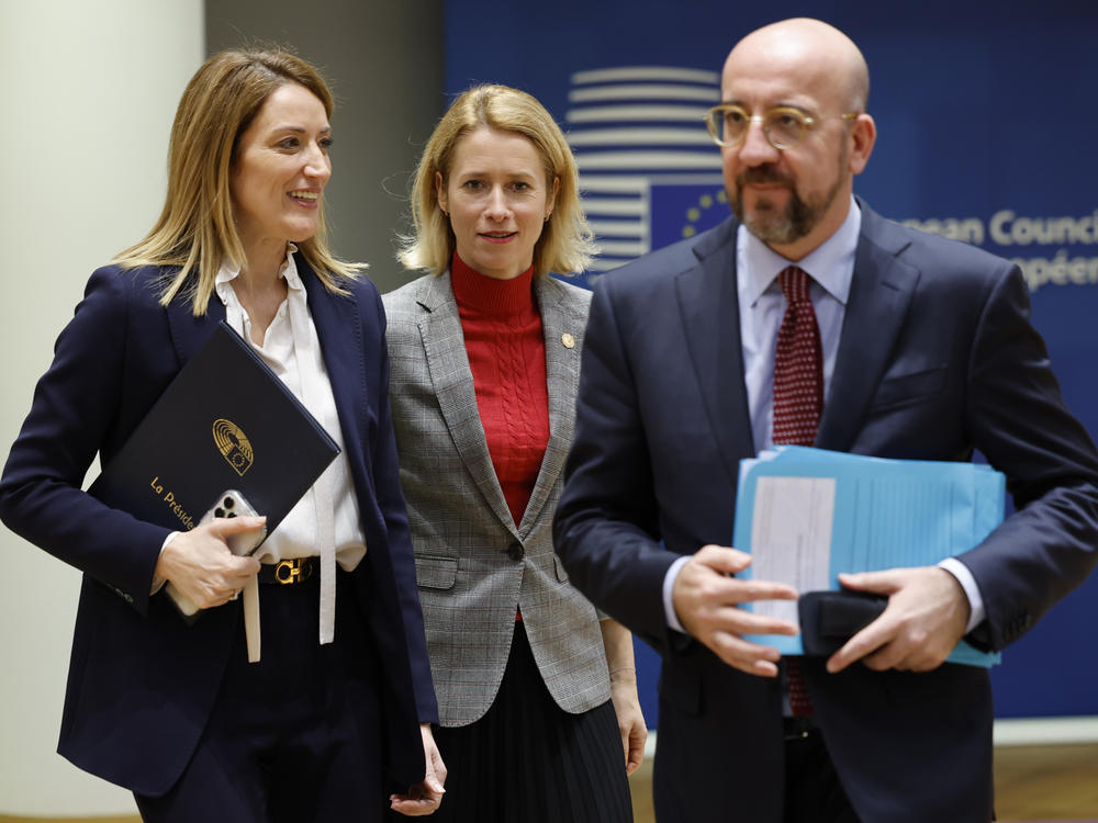 From left, European Parliament President Roberta Metsola, Estonia's Prime Minister Kaja Kallas and European Council President Charles Michel arrive to a round table meeting at an EU summit in Brussels, Thursday. 