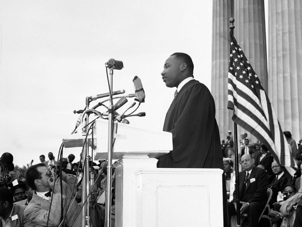 King speaks at a mass demonstration at the Lincoln Memorial in Washington, D.C., on May 17, 1957, as civil rights leaders called on the U.S. government to put more teeth into the Supreme Court's desegregation decisions.