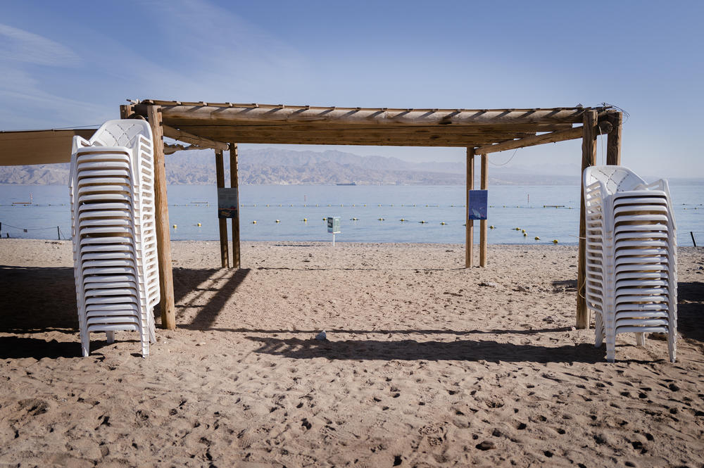 An empty beach in Eilat, Israel. The war has transformed this once-booming southern Israeli tourist destination into a deserted resort of empty shops and beach fronts. Instead of tourists, the hotels shelter Israelis who were evacuated after the Oct. 7 Hamas attack.