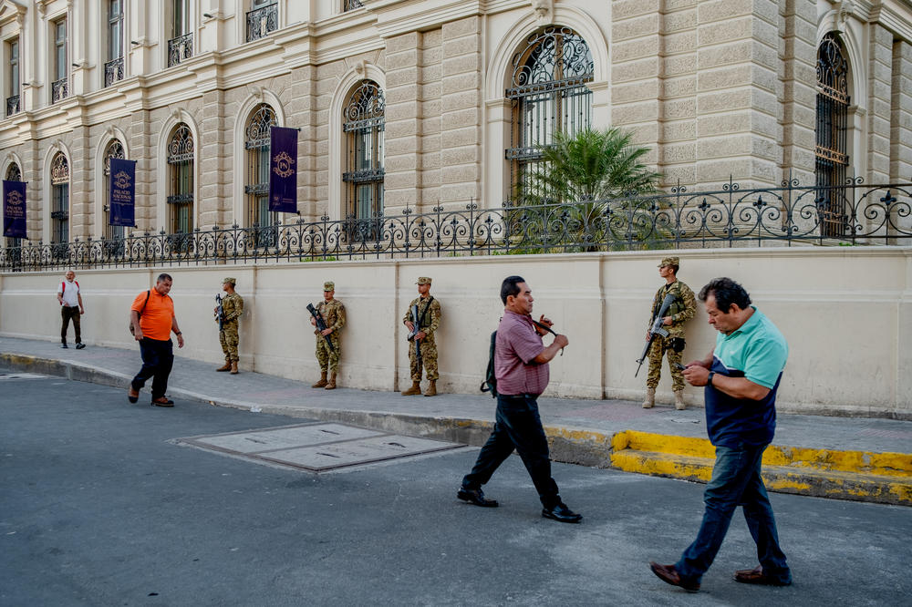 A soldier patrols downtown San Salvador on January 30, 2024. For decades, downtown San Salvador was a disputed territory between the Barrio 18 gang and MS-13.