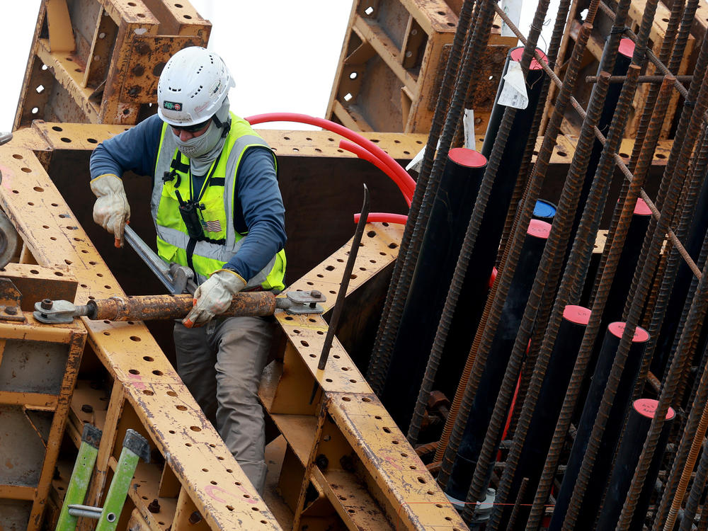 A construction worker is seen in Miami on Jan. 5, 2024. U.S. employers added more jobs than expected in January including in the construction sector.