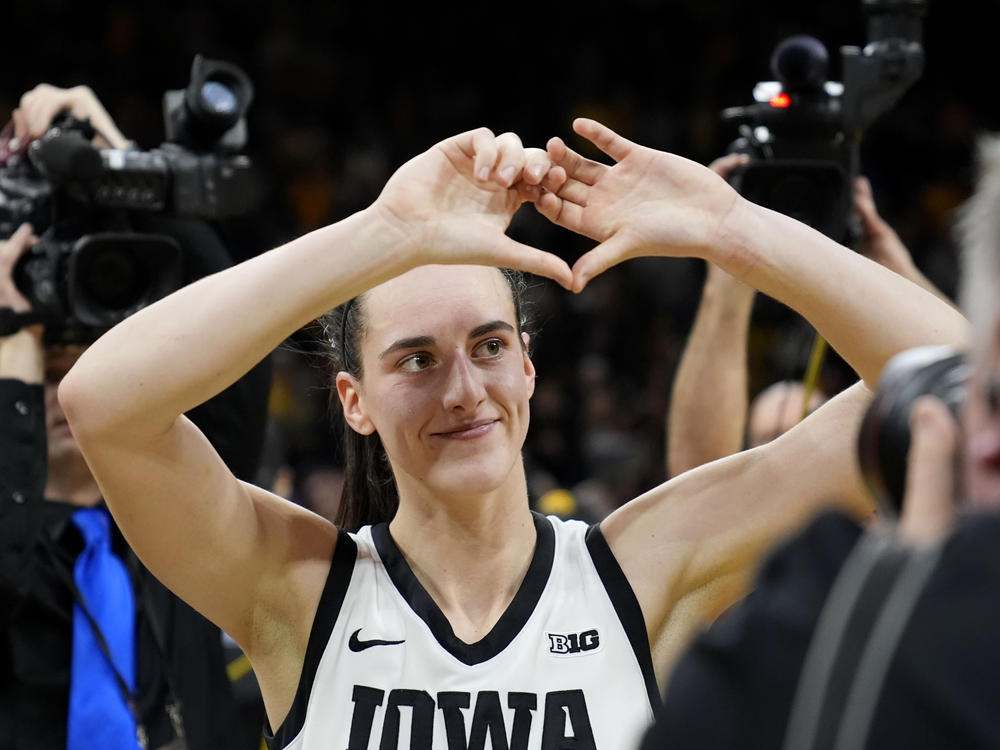 Iowa guard Caitlin Clark celebrates as she walks off the court after an NCAA college basketball game against Nebraska on Jan. 27.