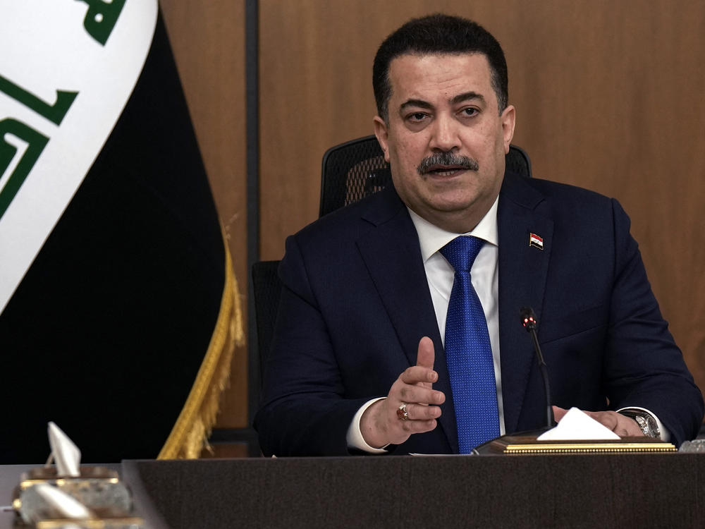 Iraqi Prime Minister Mohammed Shia al-Sudani chairs a meeting with top-ranking officials of the Iraqi armed forces and of the U.S.-led coalition about the future of American and other foreign troops in the country, in Baghdad on Jan. 27.