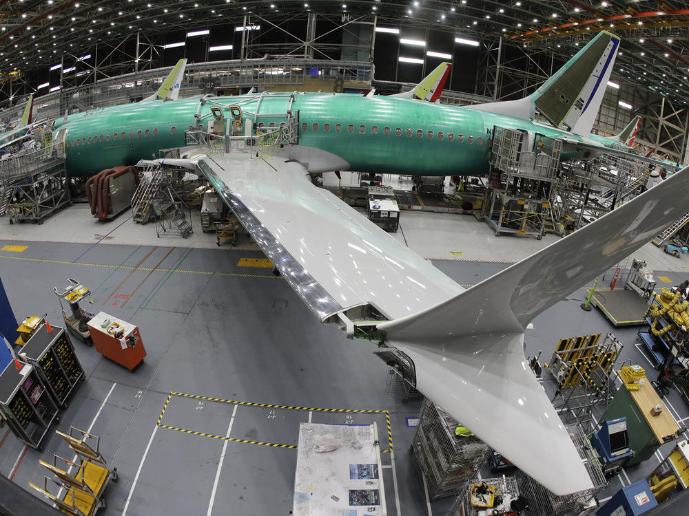 A 737 Max 8 undergoes final assembly inside Boeing's factory in Renton, Wash., on March 27, 2019. Kansas-based Spirit AeroSystems makes the fuselages and ships them to Washington. A series of production issues at Spirit have led to problems.
