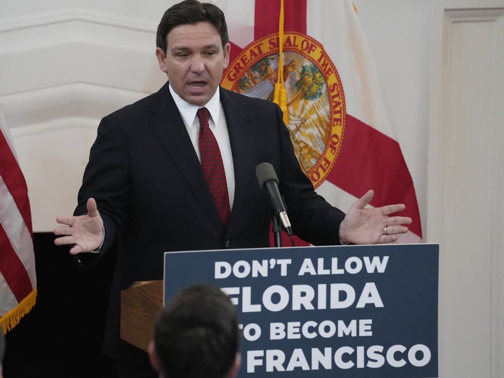 Florida Gov. Ron DeSantis speaks Monday in Miami Beach, Fla. backing legislation that would ban homeless camps on public property except for designated areas.