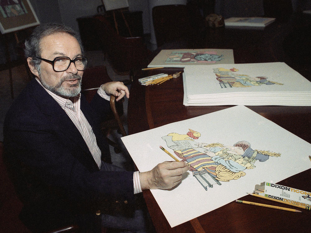 Artist Maurice Sendak signs prints July 26, 1990 in New York.