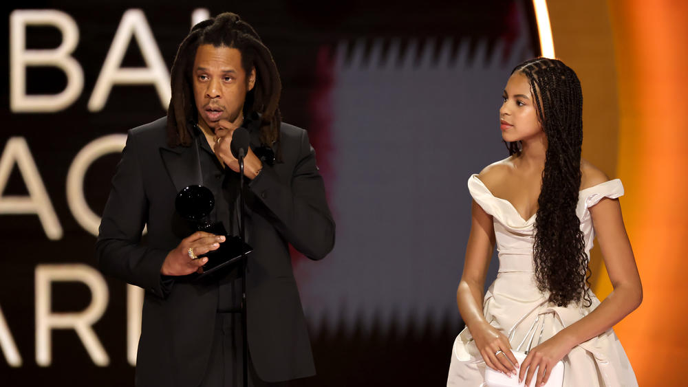 Honoree Jay-Z accepts the Dr. Dre Global Impact Award with Blue Ivy Carter onstage during the 66th Grammy Awards.