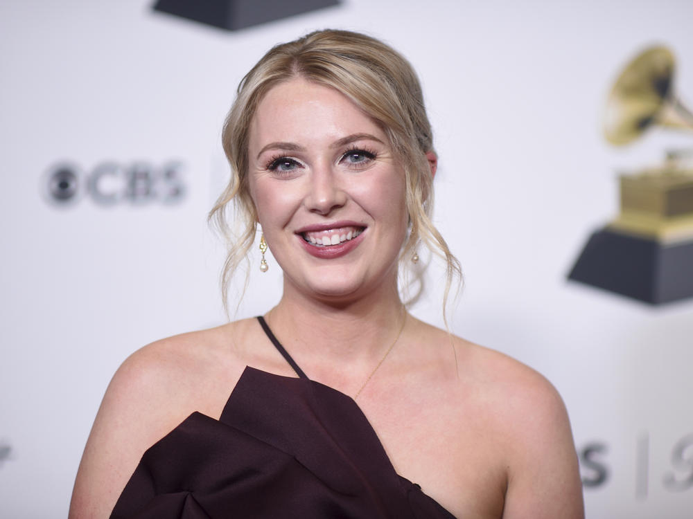 Virginia music educator Annie Ray poses in the press room during the 66th annual Grammy Awards in Los Angeles on Sunday.
