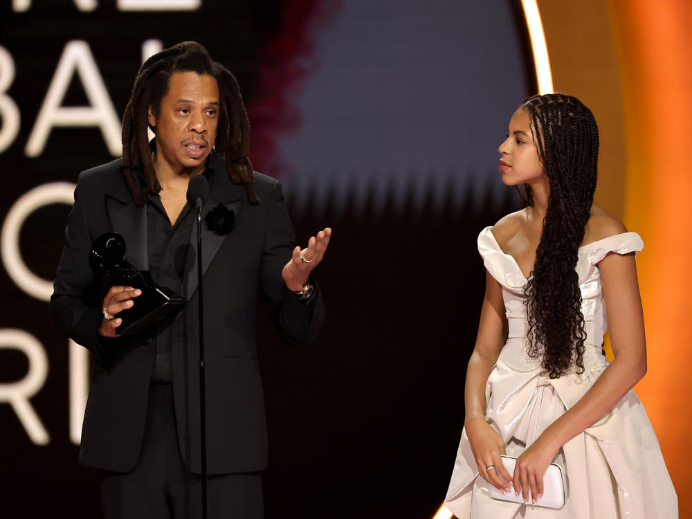 Jay-Z (left) accepts the honorary Dr. Dre Global Impact Award alongside his daughter, Blue Ivy Carter, during the 66th Grammy Awards on February 04, 2024 in Los Angeles, Calif.
