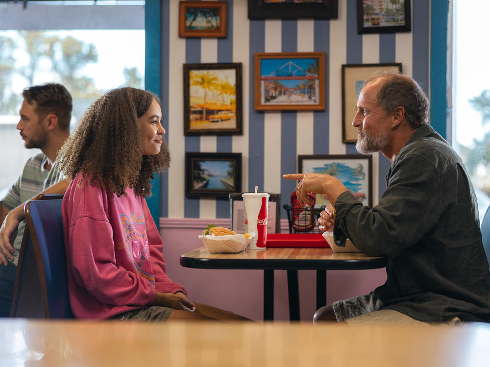 Nico Parker and Woody Harrelson in <em>Suncoast</em>.