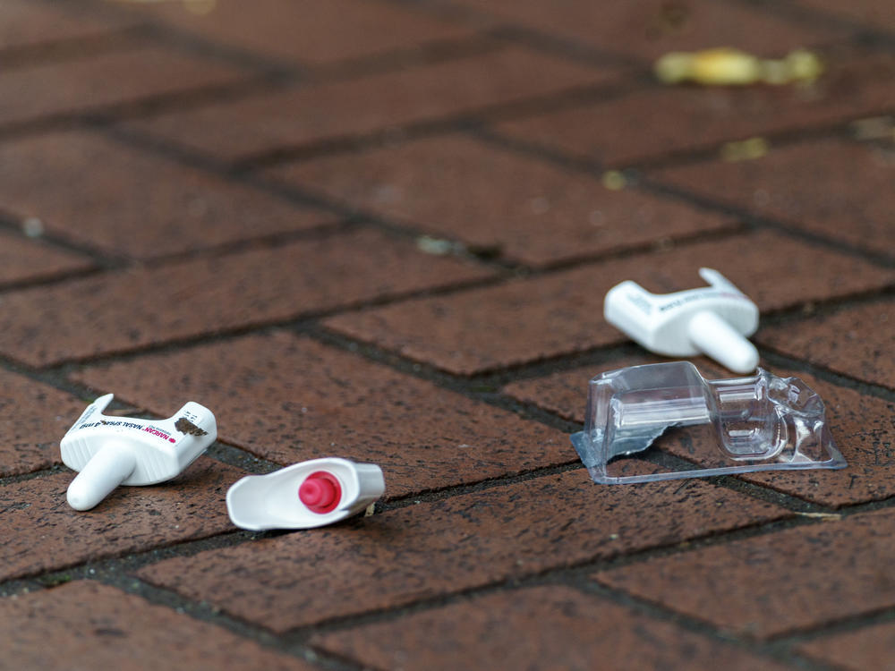 A used Narcan bottle lays on the ground in Portland, Ore.