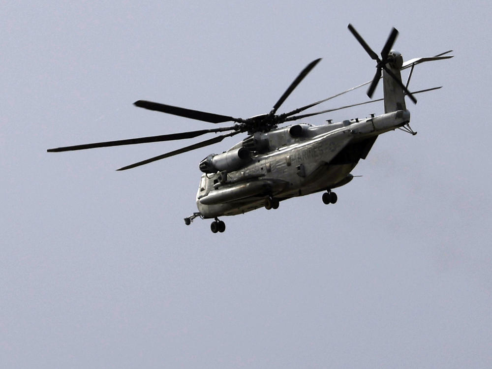 A Marine CH-53E Super Stallion helicopter flies during training at Marine Corps Air Station Miramar in San Diego on Tuesday. A Marine Corps helicopter, like the one pictured, that had been missing with five troops aboard was found Wednesday morning in a mountainous area outside San Diego.