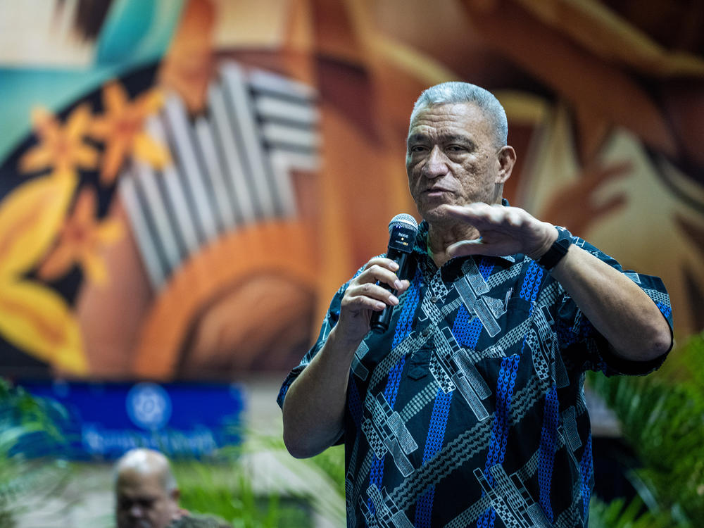 Maui Mayor Richard Bissen speaks at a weekly community meeting at the Lahaina Civic Center. He's hopeful people who lost tourism-related jobs can find new work in the cleanup and rebuilding.