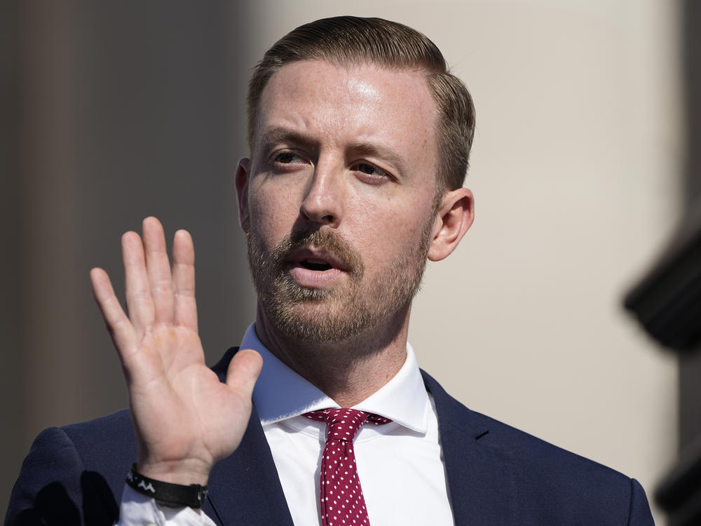 Oklahoma Superintendent of Public Instruction Ryan Walters, seen here taking his oath of office in January, 2023, announced a bonus program for teachers last spring aimed at addressing the state's teacher shortage.